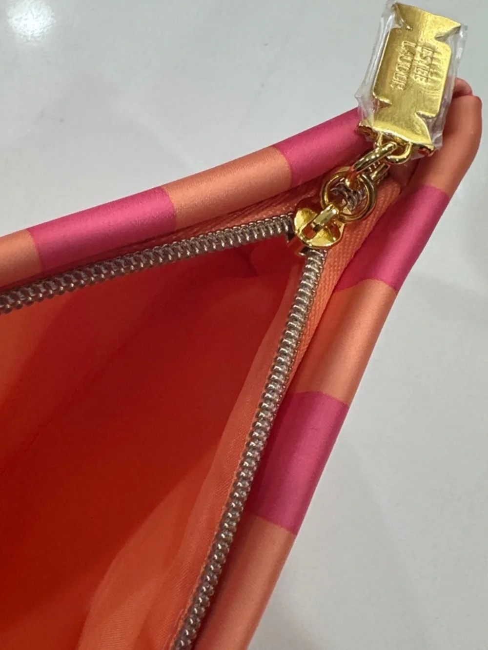 ESTEE LAUDER Pink Coral Striped Satin Pouch with Gold Hardware
